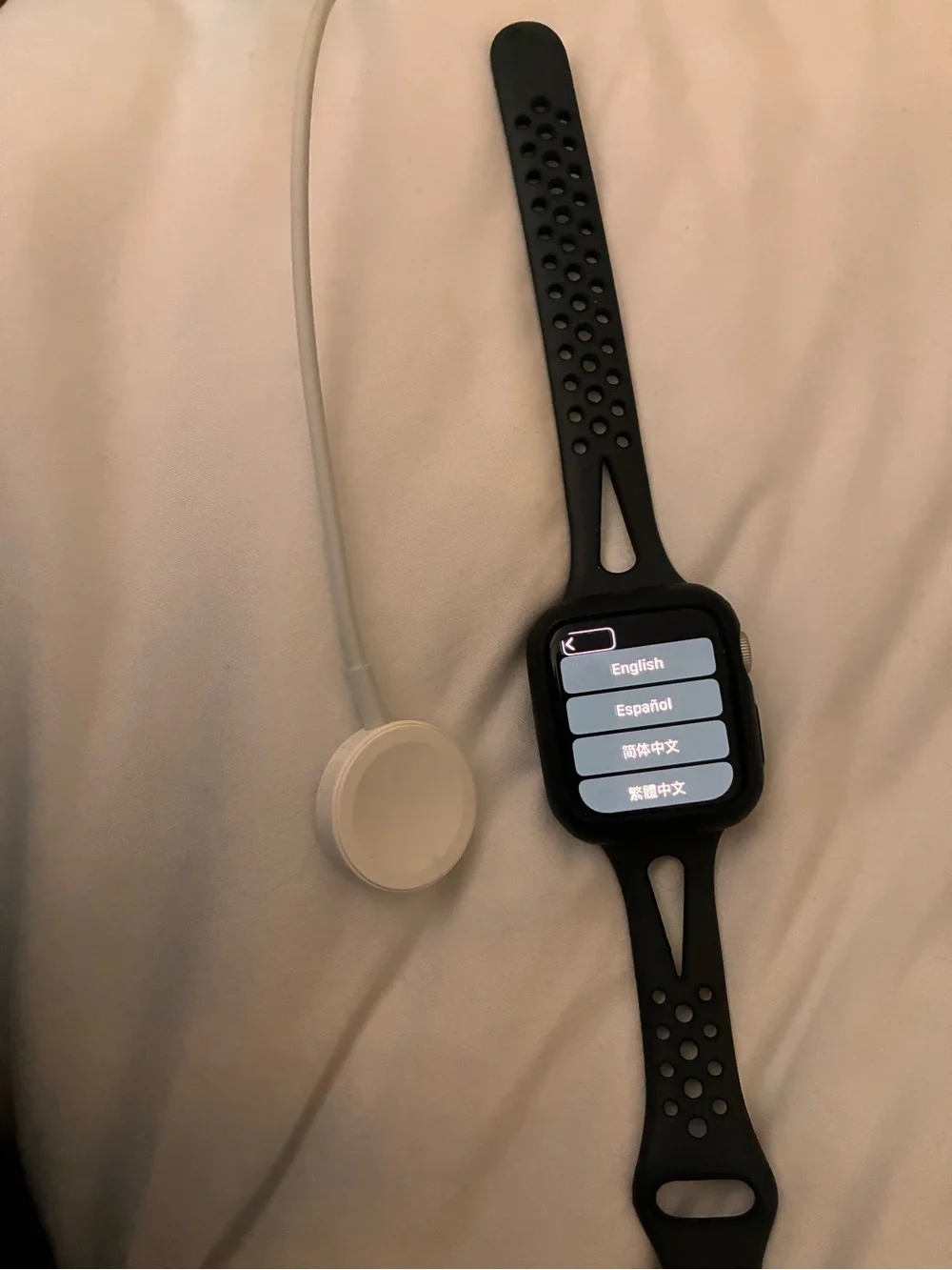 Apple Watch Series 5 GPS 44mm with black sports band and charger